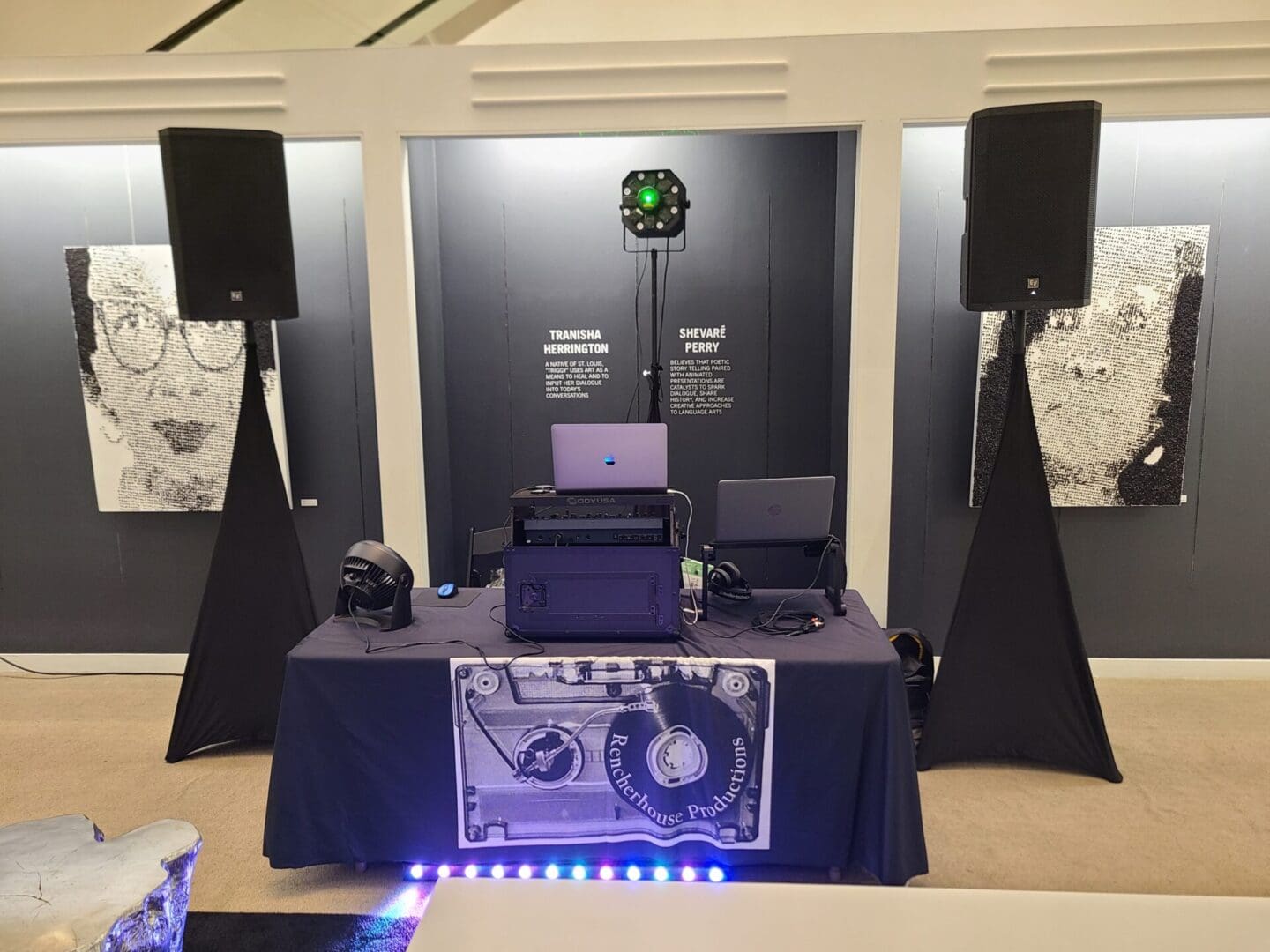 A table with speakers and lights on it